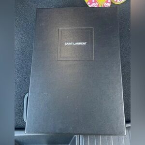 All black, closed toe, mid heel, YSL logo heels. Brand new never worn. Size 39